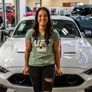 Worn and Signed Women’s Small UFC shirt.